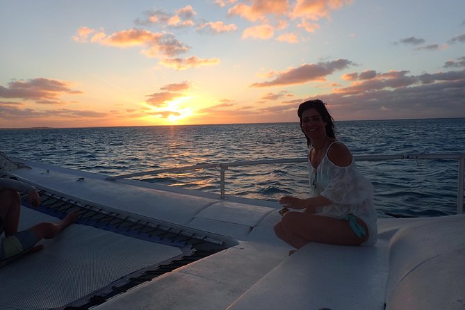 2 Hour Champagne Sunset Cruise from Grace Bay, Providenciales (Adult Only) - A Grace Bay sunset with a glass in hand