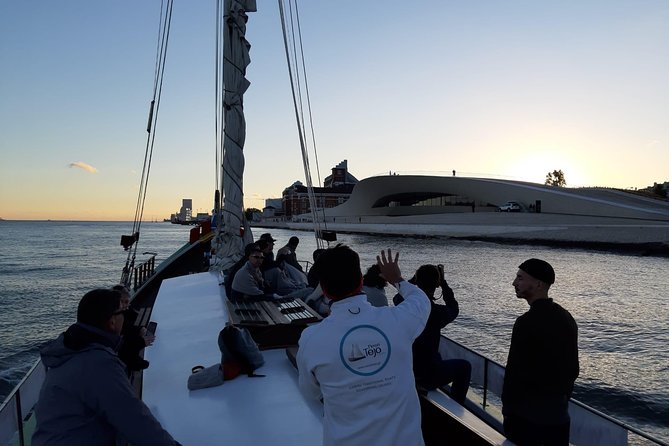 2-Hour Lisbon Traditional Boats Sunset Cruise with White Wine - Lisbon’s old hills from the water