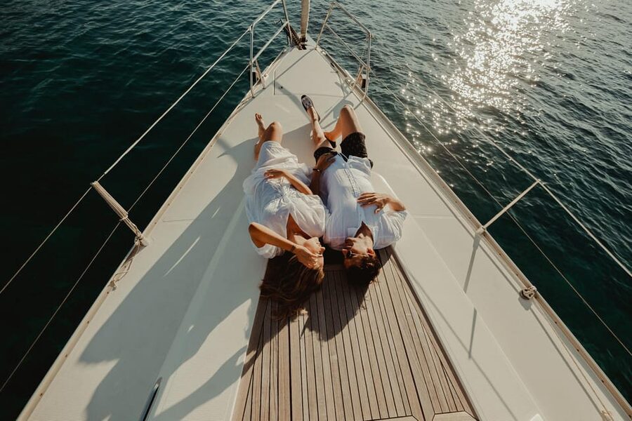 Agios Nikolaos: Golden Hour Sailboat Tour with Wine & Snacks - Sailing out of Agios Nikolaos into Mirabello Bay