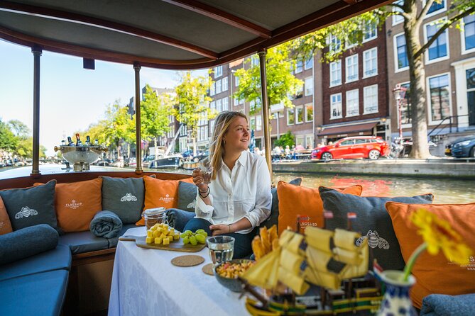 Amsterdam Canal Cruise with Cheese and Wine - Timing, meeting points, and seating