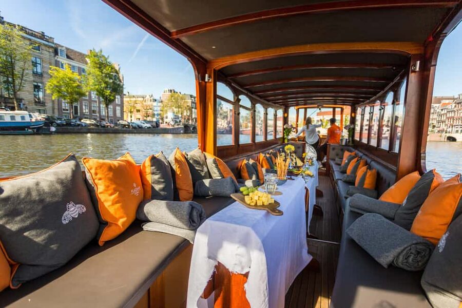 Amsterdam: Classic Saloon Boat Cruise with Cheese & Wine - Why Amsterdam looks better from a low canal boat