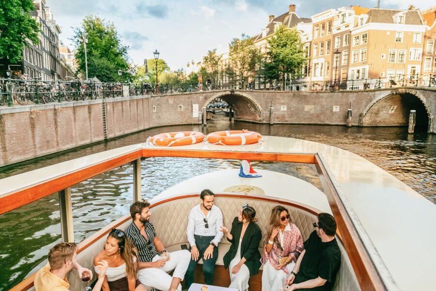 Amsterdam: Classic Saloon Boat Cruise with Cheese & Wine - The Skinny Bridge and the Amstel River