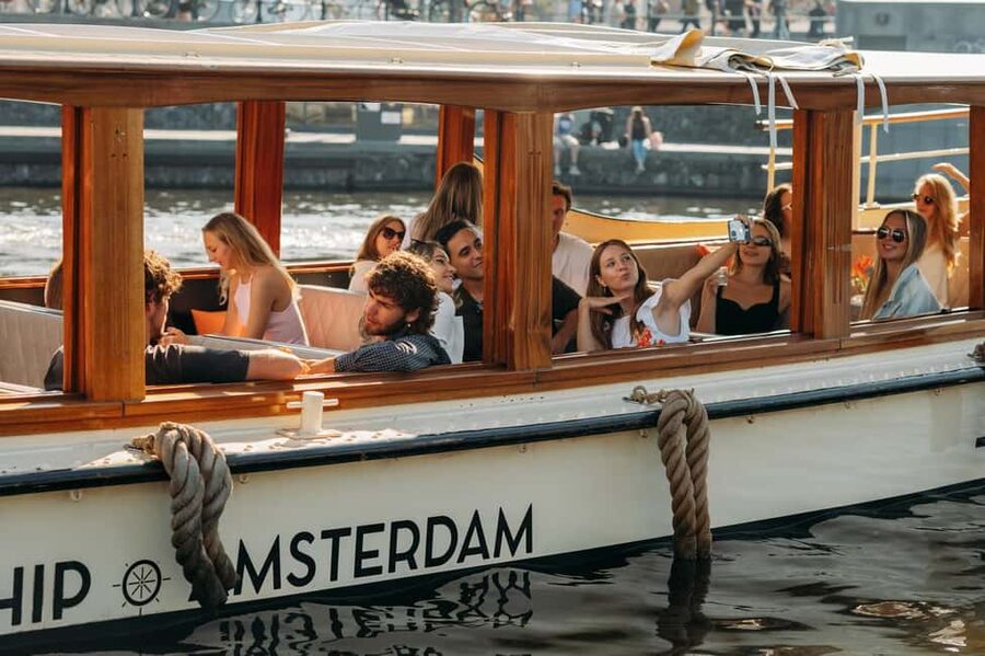 Amsterdam: Classic Saloon Boat Cruise with Cheese & Wine - Old Harbor, locks, and the Maritime Museum