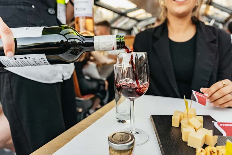 Amsterdam: Cozy Cheese & Wine Cruise Tasting Experience - Settling into the heated cabin