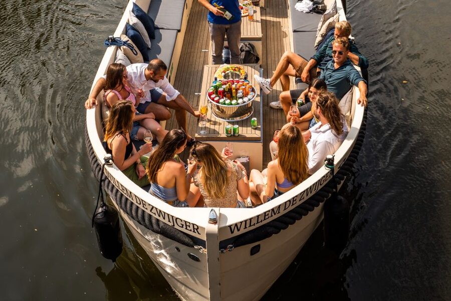 Amsterdam: Evening Candle Light Cruise With Wine & Cheese - What the guides add to the experience