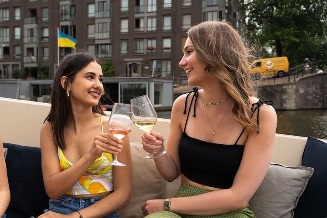 Amsterdam: Evening Candle Light Cruise With Wine & Cheese - Herengracht, the Golden Bend, and Seven Bridges