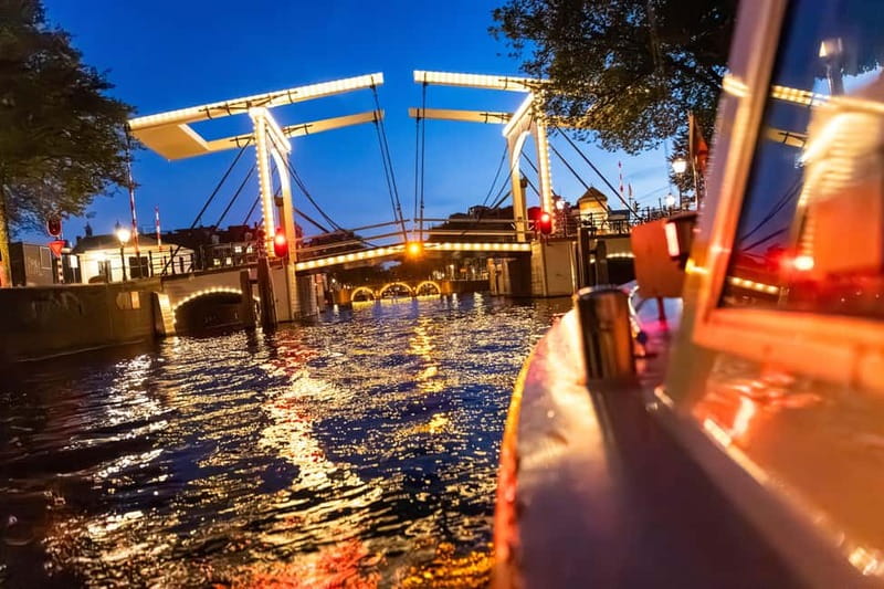Amsterdam: Evening Cruise with Optional Wine and Snacks - Royal Theater Carré and the Amstel Hotel