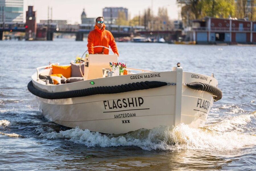 Amsterdam: Private Prosecco Canal Cruise Tour - A party boat with Amsterdam views