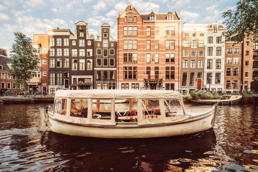 Amsterdam: Private Romantic Evening Boat Tour with Prosecco - Prosecco, Dutch snacks, and a blanket