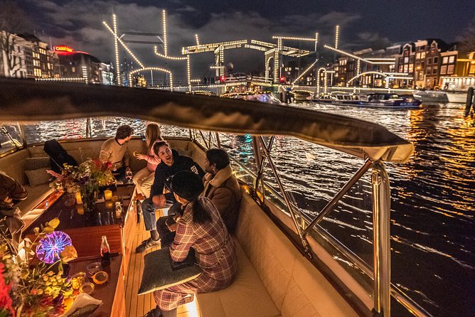 Amsterdam Small-Group Evening Canal Cruise Including Wine, Craft Beer, Cheese - Comfort on a narrow Amsterdam boat