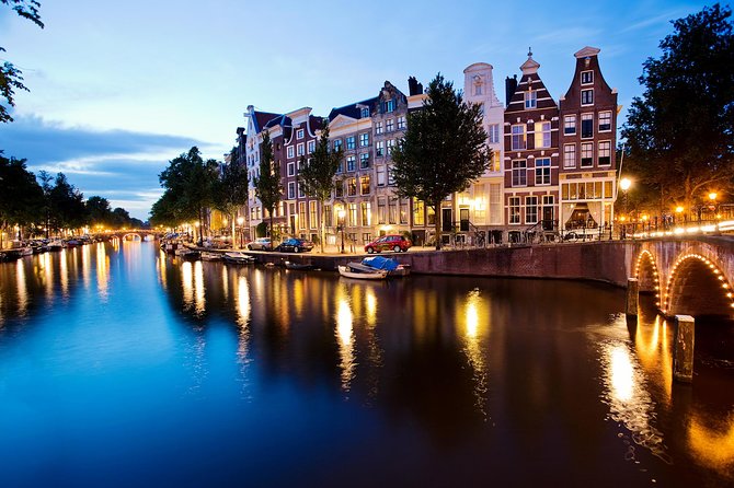 Amsterdam Wine and Cheese Evening Cruise - Magere Brug Under Evening Lights