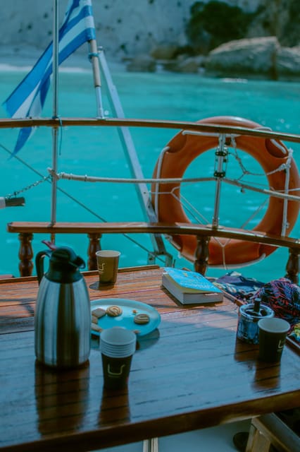 Argostoli: Full-Day Boat Trip with Lunch & Wine - Xi Beach and its red clay