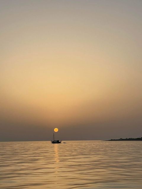 Argostoli: Sunset Cruise with Swim Stops, Dinner, and Wine - Swimming near the Vardiani Islands