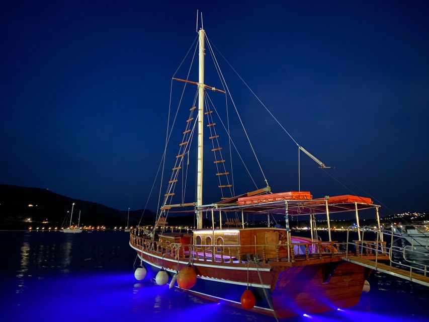 Argostoli: Sunset Cruise with Swim Stops, Dinner, and Wine - Xi Beach and its red-colored sand