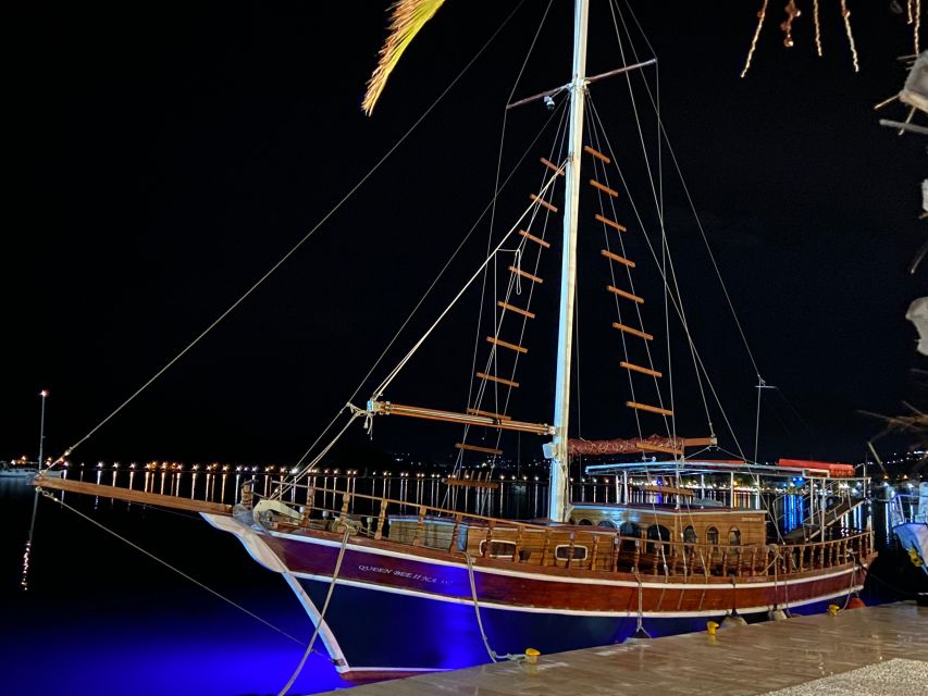 Argostoli: Sunset Cruise with Swim Stops, Dinner, and Wine - Dinner on deck as the sun sets
