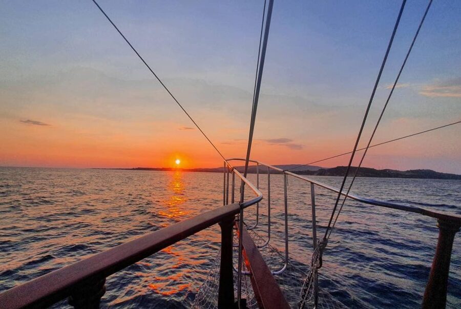 Argostoli: Sunset Cruise with Swim Stops, Dinner, and Wine - The sunset and the ride home