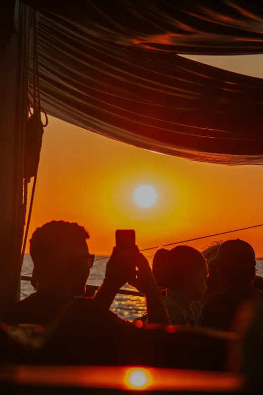 Argostoli: Sunset Cruise with Swim Stops, Dinner, and Wine - Leaving Argostoli harbor