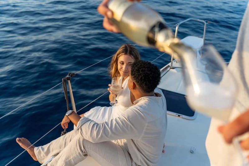 Barcelona: Catamaran Cruise w/ Sailing, Wine, & Tapa - Wine, cava, and a traditional tapa on the way back