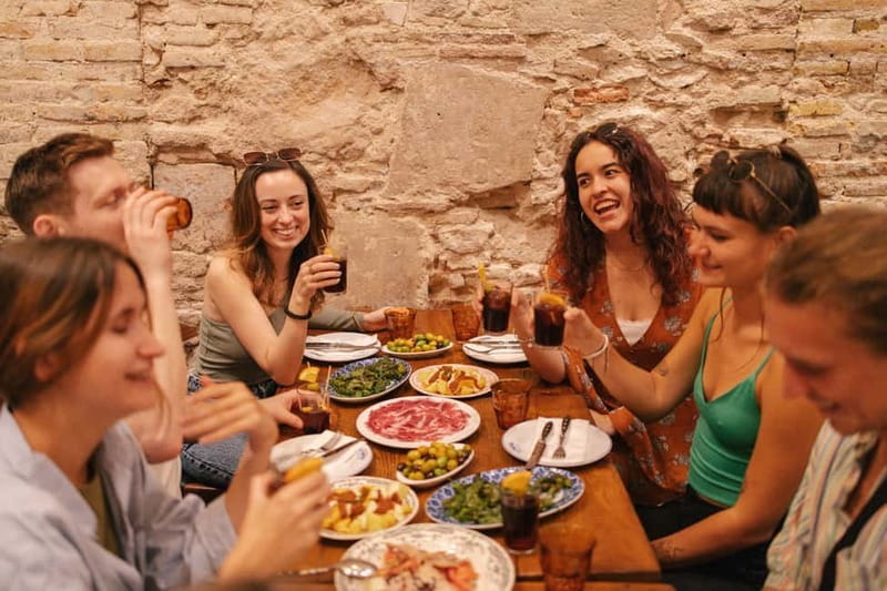 Barcelona: Food Walking Tour with Tapas and Wine - What the $100 price really covers