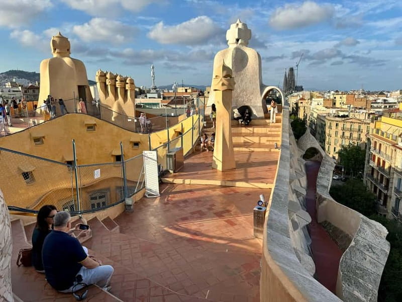 Barcelona: Sagrada Familia, La Pedrera & Cava Tasting Tour - A short walk through Eixample’s modernist streets