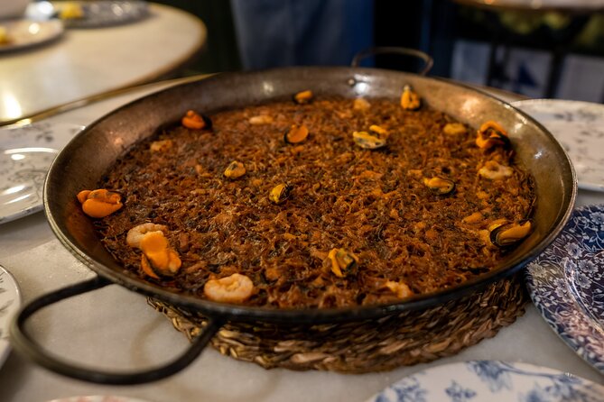 Barcelona Side Streets Tapas & Wine Tour - What the guide adds