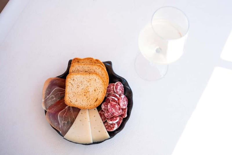Barcelona: Sunset Catamaran Cruise with Wine and Tapa - Booking, cancellation, and timing
