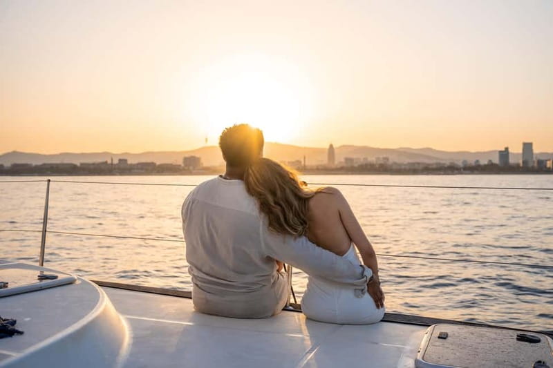Barcelona: Sunset Catamaran Cruise with Wine and Tapa - Leaving the harbor and getting settled aboard