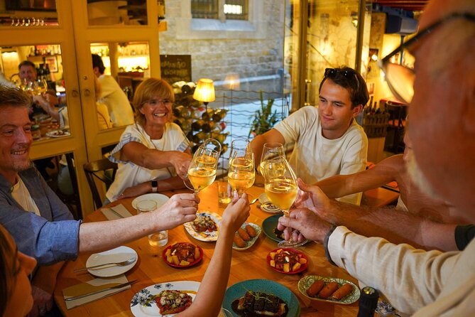 Barcelona Tapas and Wine Experience Small-Group Walking Tour - What the guide adds to the meal