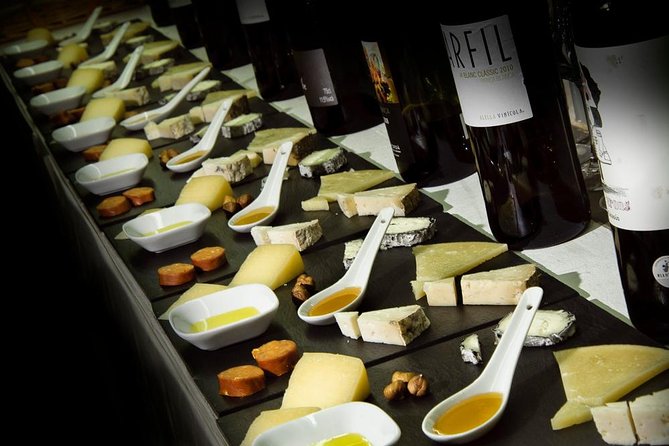 Barcelona: Wine Tasting and 5 Course Tapas Pairing Dinner - The dinner starts with cheese and Iberian cold cuts