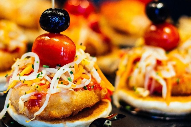 Barcelona With Locals: Wine and Tapas Private Tour - Mercat de Sant Antoni: A Market Before the Bars