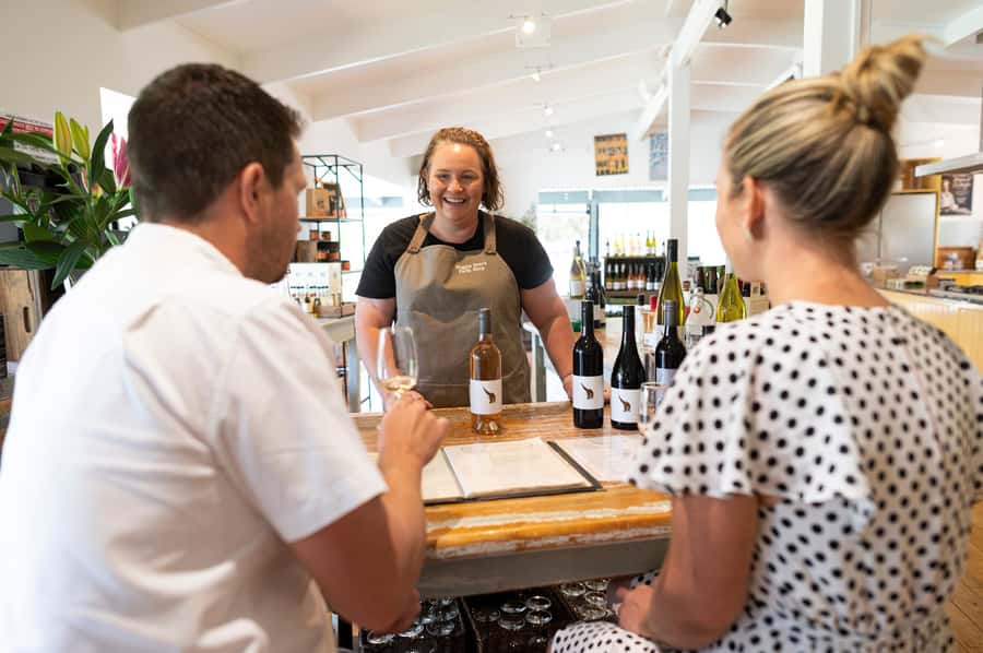 Barossa Valley: Maggie Beer's Wine Tasting & Cheese Platter - Cheese, a full glass, and views of the dam