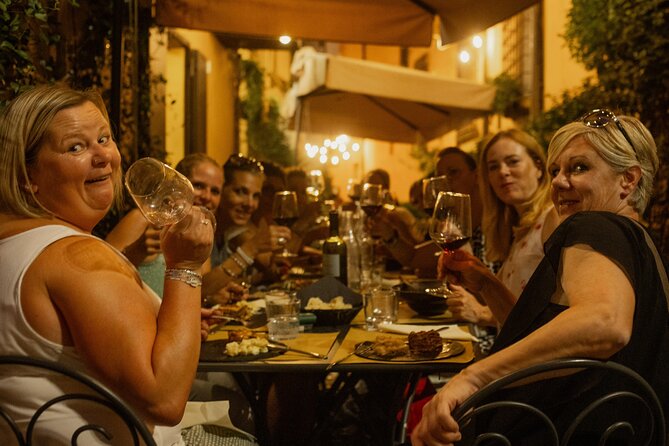 Bologna: Dinner, Wine & Tastings Walking Tour - Stories between the tasting stops