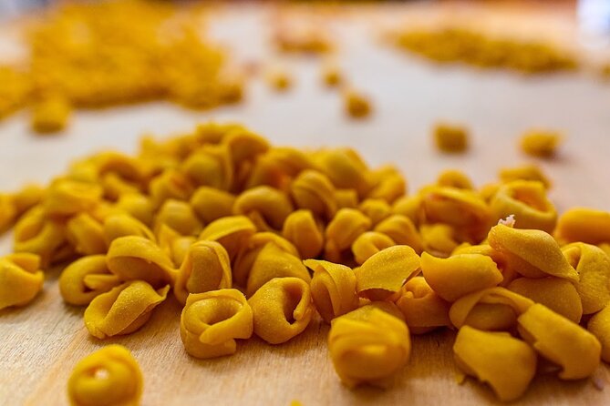 Bologna Food & Market Tour with 6 Tastings, Pasta, Wines & More - Wine, gelato, coffee, and the final bites