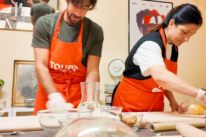 Bologna Local Pasta Cooking Class, Ragu, Spritz, Wine & Gelato - Cutting Tagliatelle the Bolognese Way