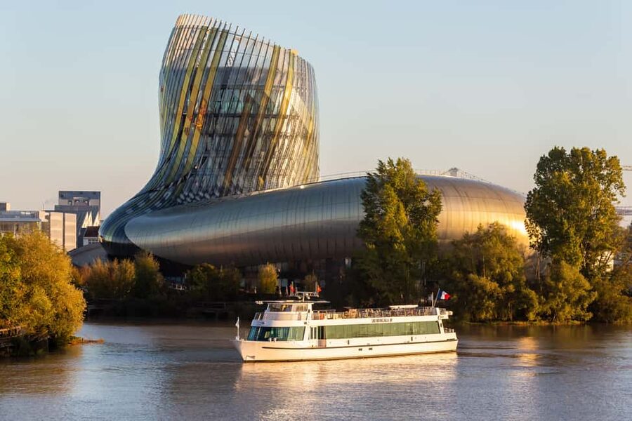 Bordeaux: Guided Wine and Canelé Discovery Cruise - Quinconces, Chartrons, and the wine trade