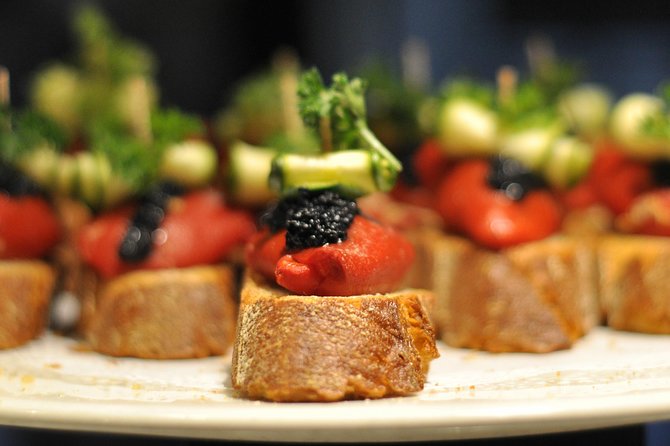 Born to Eat: Gourmet Tapas & Wine Small Group Tour in Old Barcelona - Passeig del Born and the name of the district