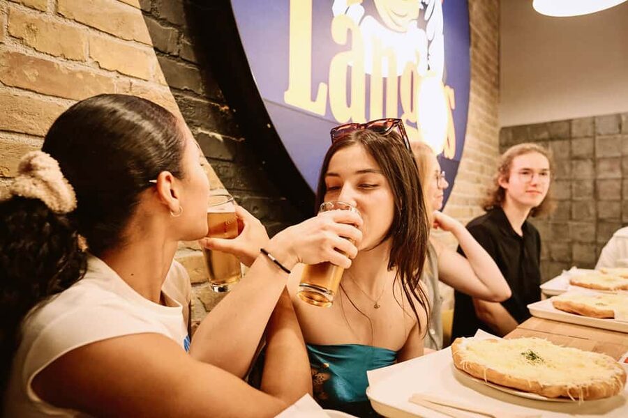 Budapest: Guided Street Food Tour with Sweet Wine - Sit-down dishes and the Hungarian table
