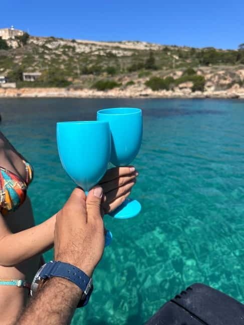 Cagliari: Boat Cruise with Stops for Swimming and Prosecco - What the $106 price includes