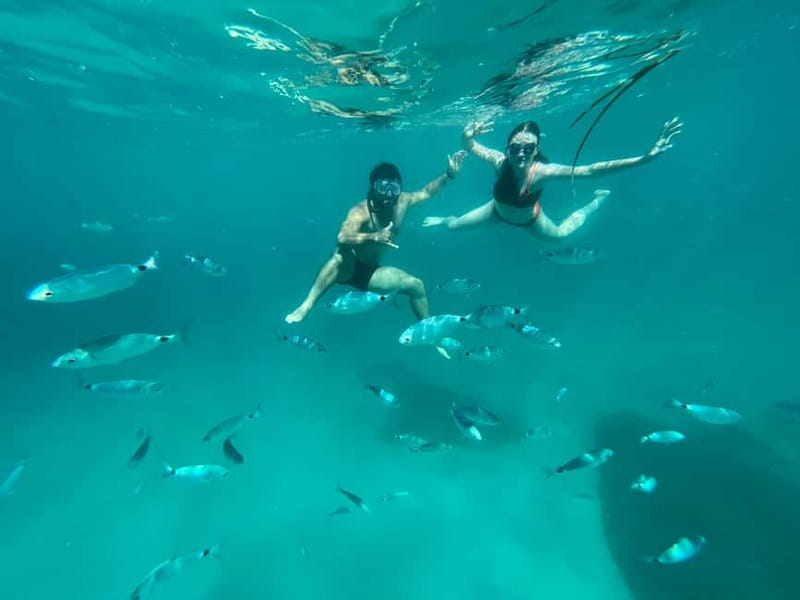 Cagliari: Boat Tour with 4 Swim Stops, Snorkeling & Prosecco - Four swim stops, chosen for the day