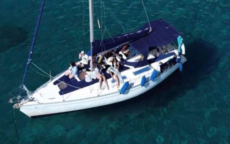 Cagliari: Catamaran Tour, Swimming, Snorkeling, & Prosecco - Reaching the Devil’s Saddle by catamaran