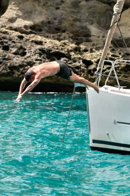 Cagliari: Catamaran Tour, Swimming, Snorkeling, & Prosecco - What the crew adds to the experience