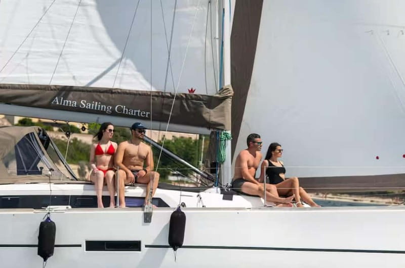 Cagliari: Catamaran Tour, Swimming, Snorkeling, & Prosecco - The first coastal views at Cala Bernat
