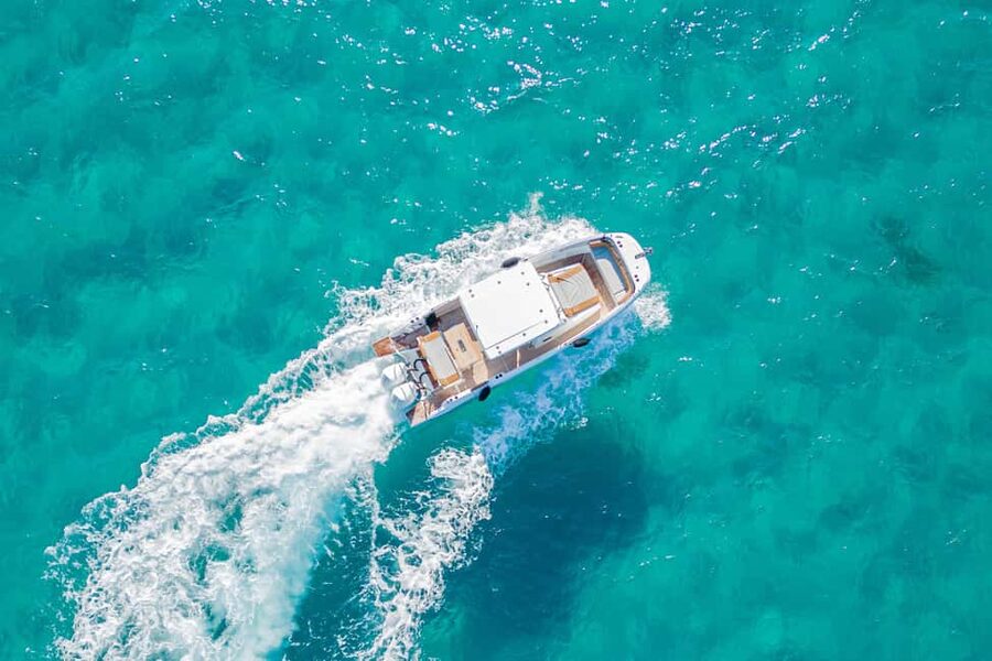 Cagliari: Luxury Motorboat Tour with 3 Swim Stops & Wine - Wine, snacks, and what the price really covers