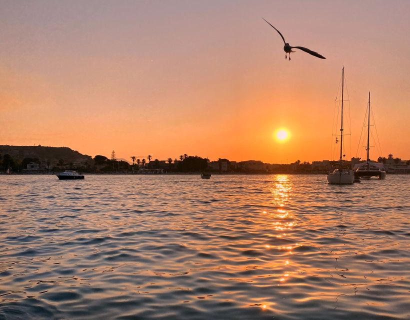 Cagliari: Sunset Boat Tour with Aperitif and Prosecco - A sunset trip built around the swim