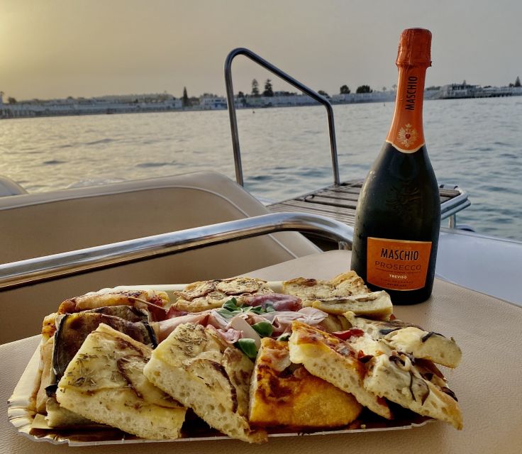 Cagliari: Sunset Boat Tour with Aperitif and Prosecco - A practical note about the swimming stop