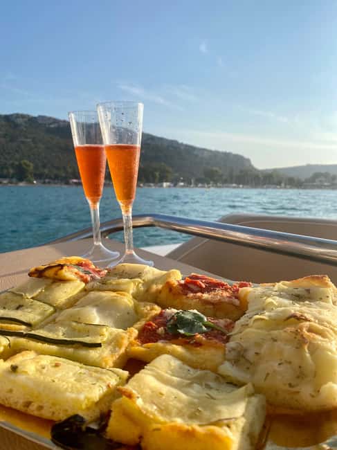 Cagliari: Sunset Boat Tour with Aperitif and Prosecco - Prosecco, snacks, and an easygoing aperitif
