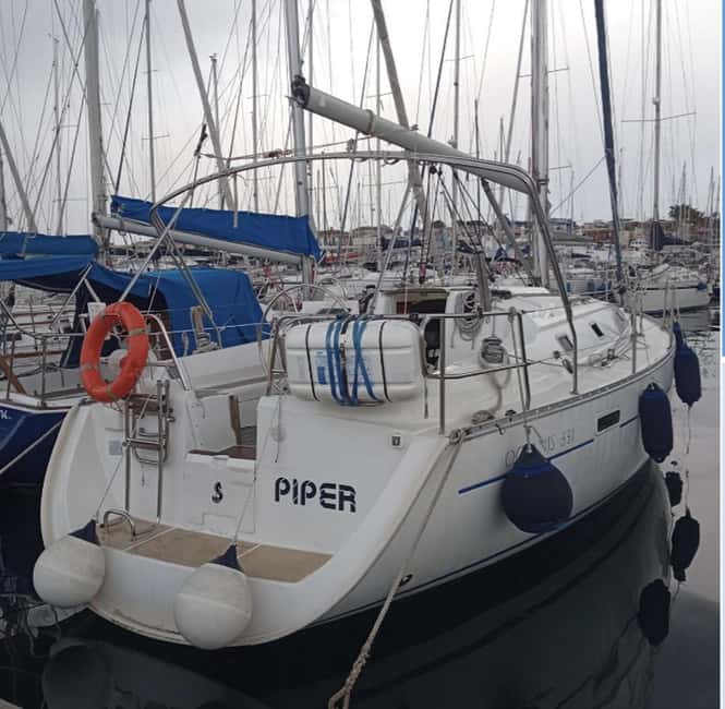 Catania: Boat Trip with Aperitif, Prosecco and Snorkeling - Ognina and the Ulysses Caves