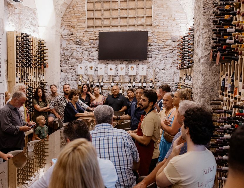 Catania: Volcanic Wine Tasting in a Metropolitan Market - Four glasses, with food matched to each one