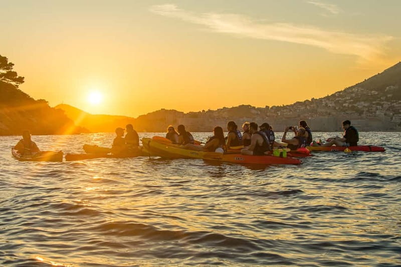 Dubrovnik: Guided Sunset Sea Kayaking Tour with Wine - Passing Lokrum as the light changes