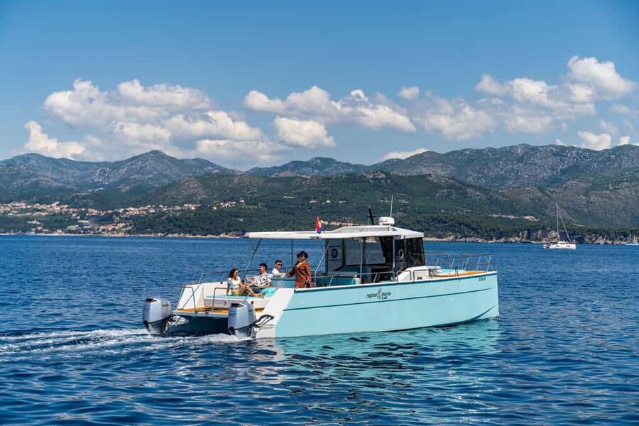 Dubrovnik: Sunset Catamaran Cruise with Sparkling Wine - The city walls from the water